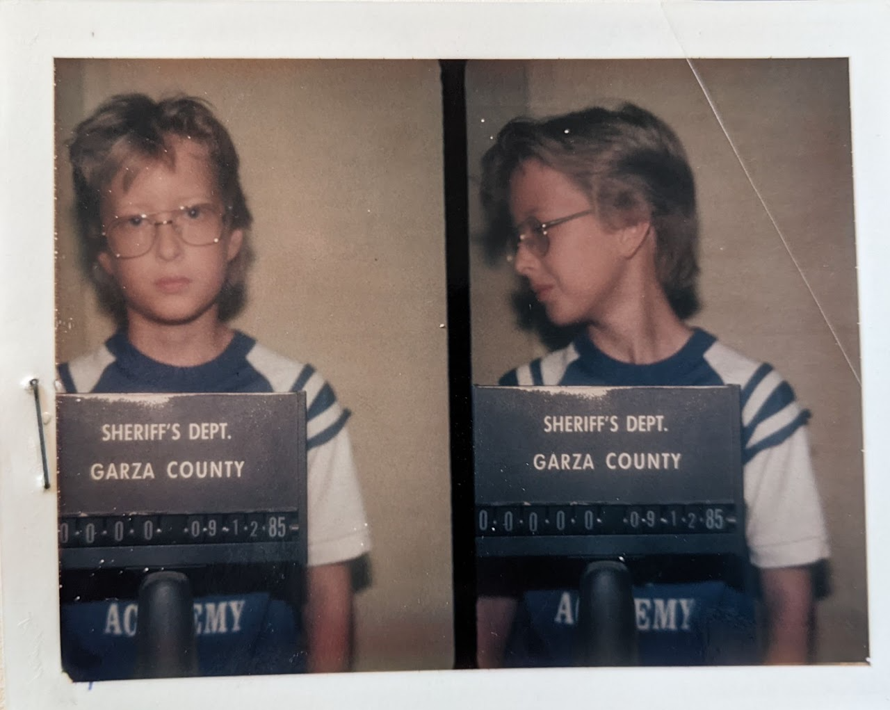 Picture of Bobby T. Lewis being booked into jail as a frickin' kid.